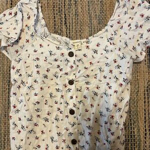 Monet Cream Ruffled Blouse with Buttoned Front